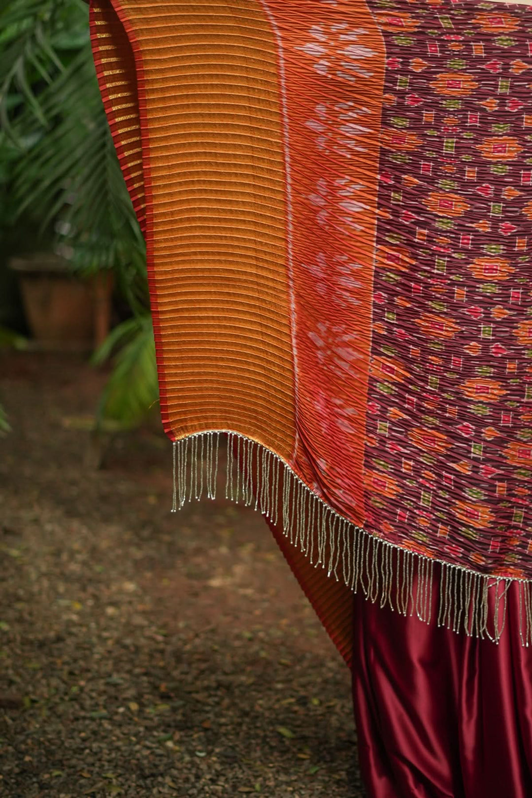 Unique Pleated half and half satin saree with Patola digital print and antique zari