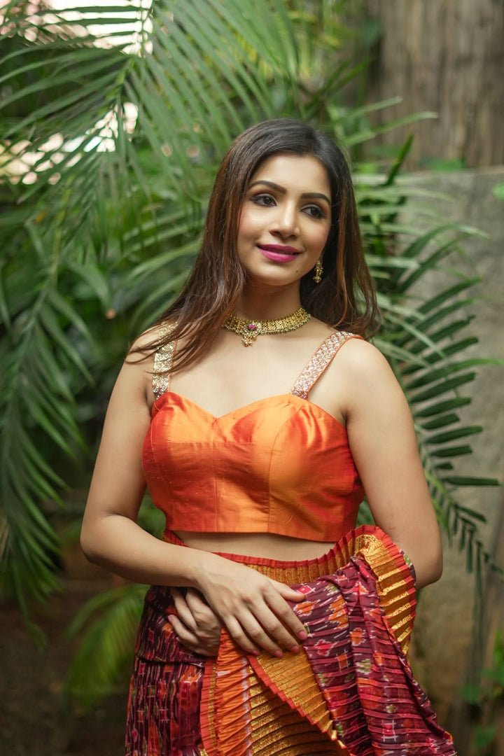 Strappy Blouse in Orange Silk with Sweetheart neckline and cutdana embellishments | SHOBITAM