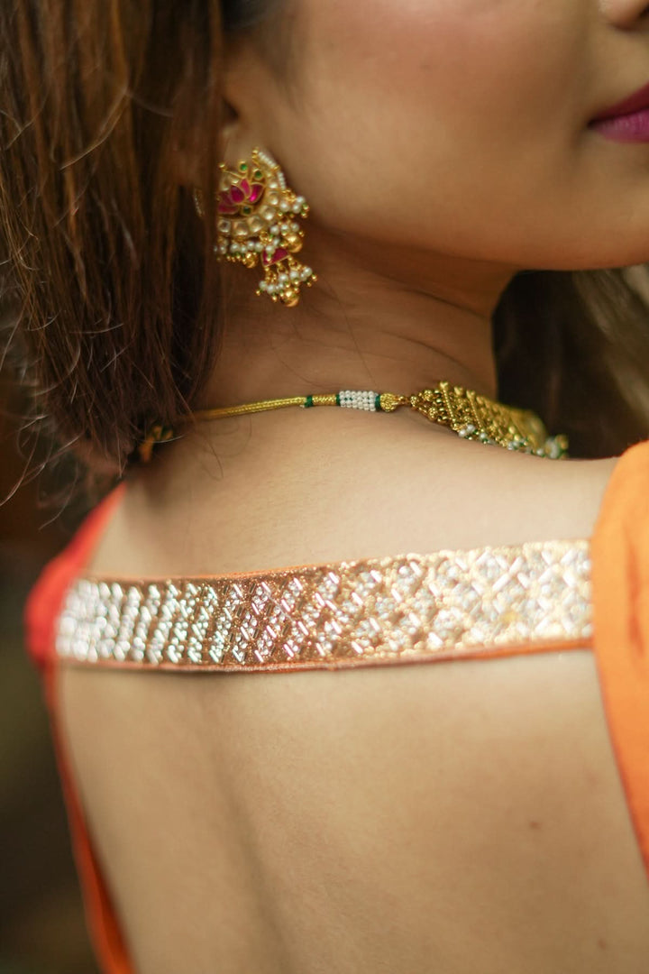 Strappy Blouse in Orange Silk with Sweetheart neckline and cutdana embellishments | SHOBITAM
