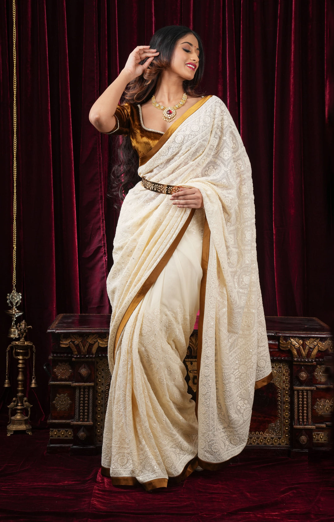 Ivory Georgette Saree with Self Embroidery and Amber Satin Trim