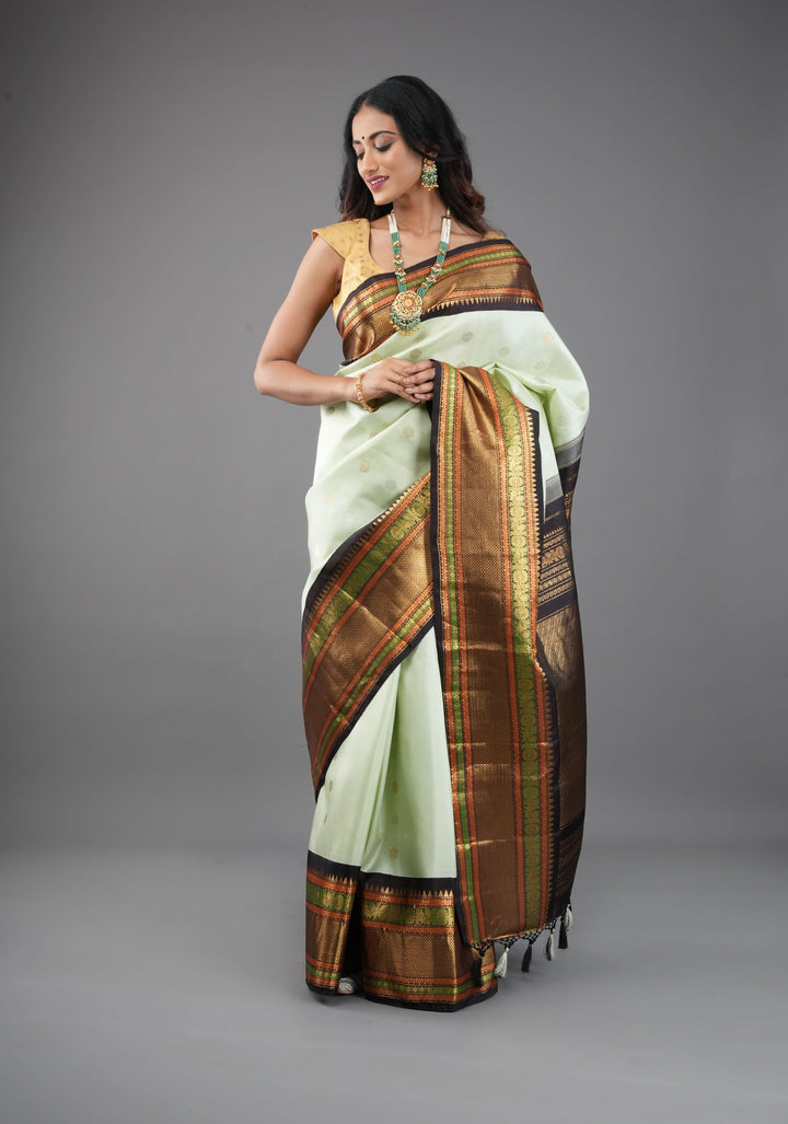 Tea Green Exquisite Korvai weave Gadwal Pure Silk Saree with zari buttas and Tri-tone Zari border| SILK MARK CERTIFIED