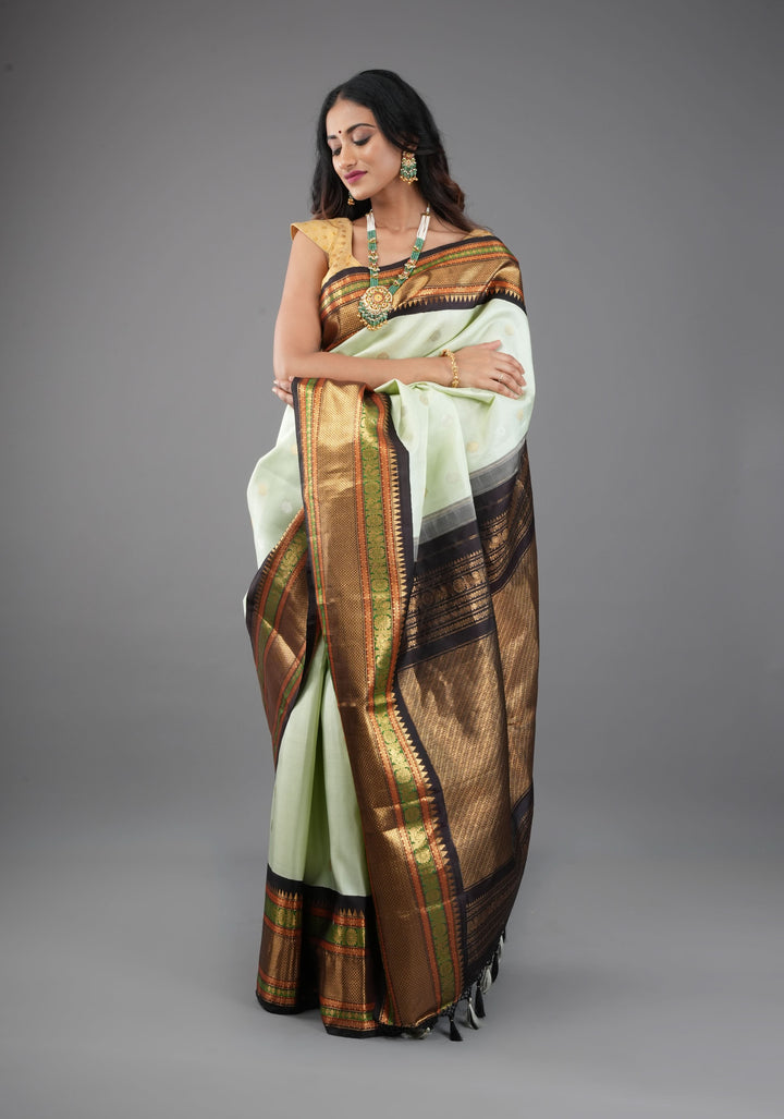 Tea Green Exquisite Korvai weave Gadwal Pure Silk Saree with zari buttas and Tri-tone Zari border| SILK MARK CERTIFIED