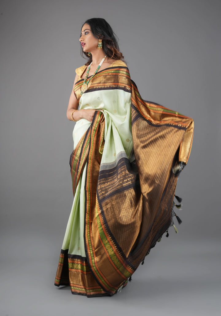 Tea Green Exquisite Korvai weave Gadwal Pure Silk Saree with zari buttas and Tri-tone Zari border| SILK MARK CERTIFIED