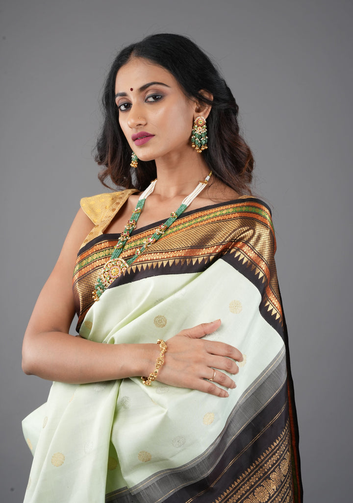 Tea Green Exquisite Korvai weave Gadwal Pure Silk Saree with zari buttas and Tri-tone Zari border| SILK MARK CERTIFIED