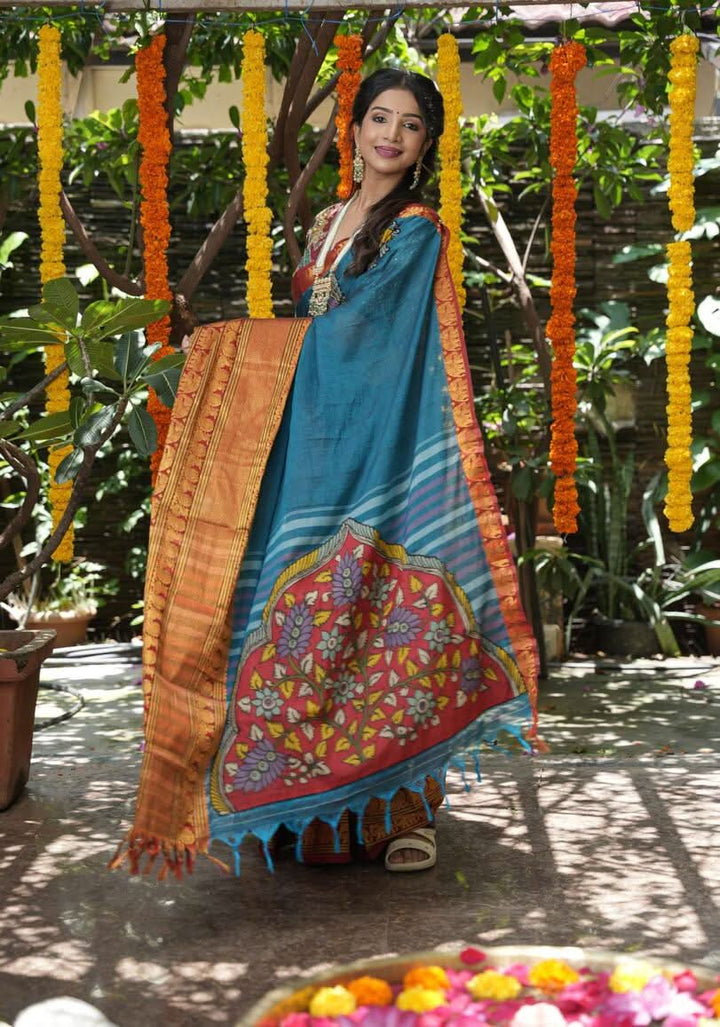 PreOrder: Peacock blue Narayanpet saree with pen kalamkari appliqué and wide zari borders