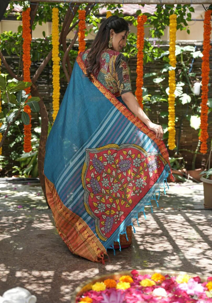 PreOrder: Peacock blue Narayanpet saree with pen kalamkari appliqué and wide zari borders