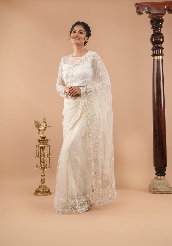 Ivory Net Saree with half jaal sequin and beadwork embellishments
