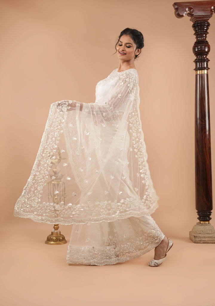Ivory Net Saree with half jaal sequin and beadwork embellishments