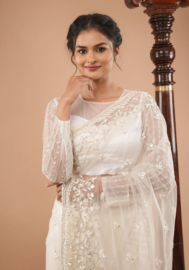 Ivory Net Saree with half jaal sequin and beadwork embellishments