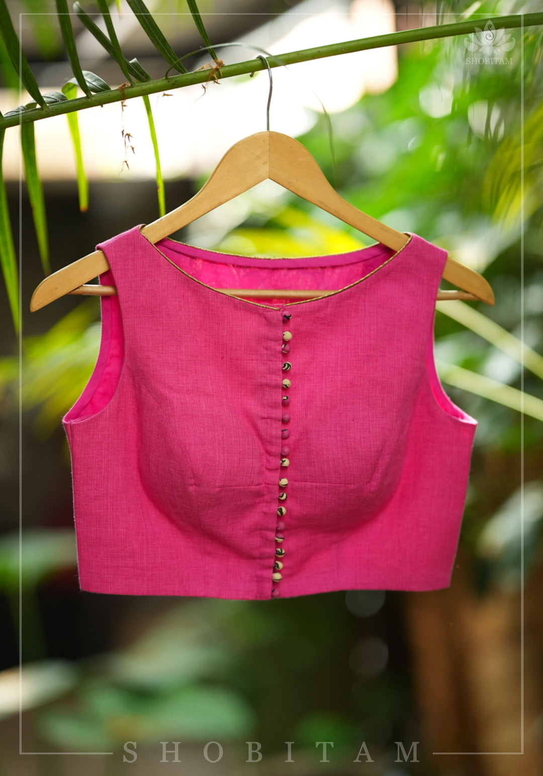 Pink handloom sleeveless Blouse with potli button detailing in front and Kalamkari applique in back | SHOBITAM