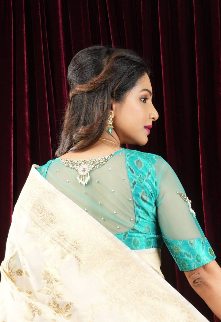 Cyan Pure ikkat  Raw silk blouse with Rhinestone detailing in back and sleeves
