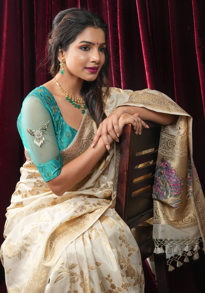 Ivory Tissue Semi silk saree with leheria Zari Floral vine Pattern and Meenakari Zari Pallu