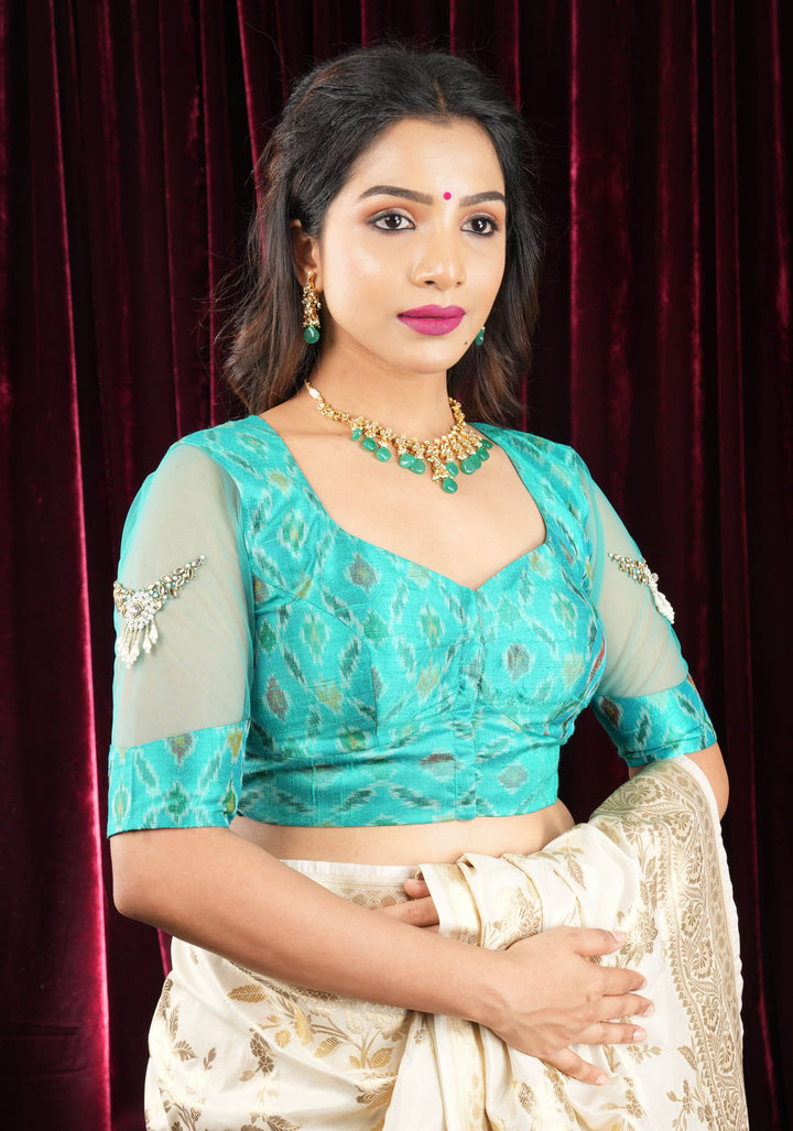 Cyan Pure ikkat  Raw silk blouse with Rhinestone detailing in back and sleeves