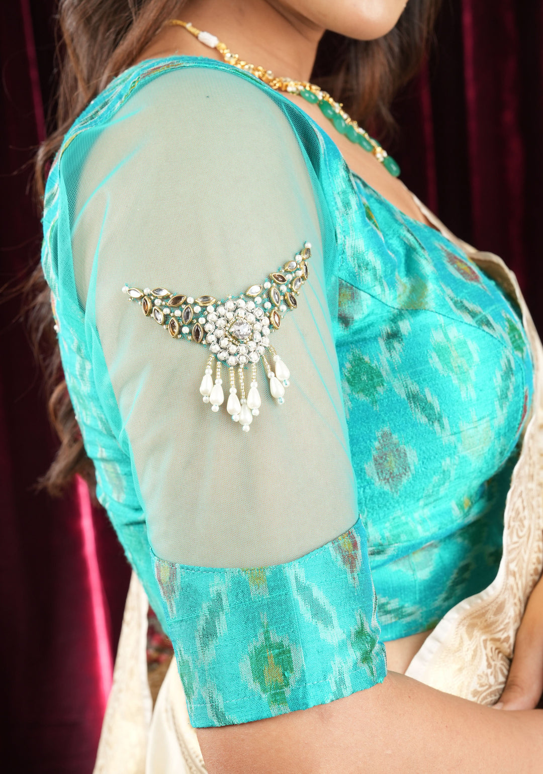 Cyan Pure ikkat  Raw silk blouse with Rhinestone detailing in back and sleeves