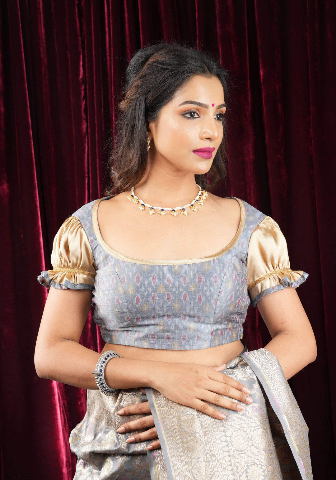 Gray Pure Ikkat Raw Silk Blouse with scoop neck and Gold Puff Sleeves
