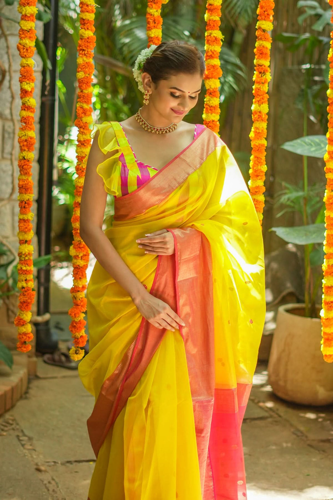 Handwoven Maheshwari Silk Cotton Saree in Yellow and Pink with zari borders