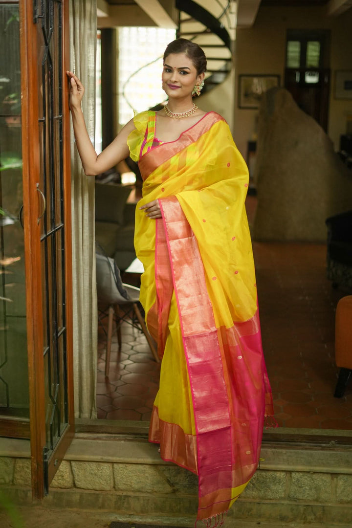 Handwoven Maheshwari Silk Cotton Saree in Yellow and Pink with zari borders