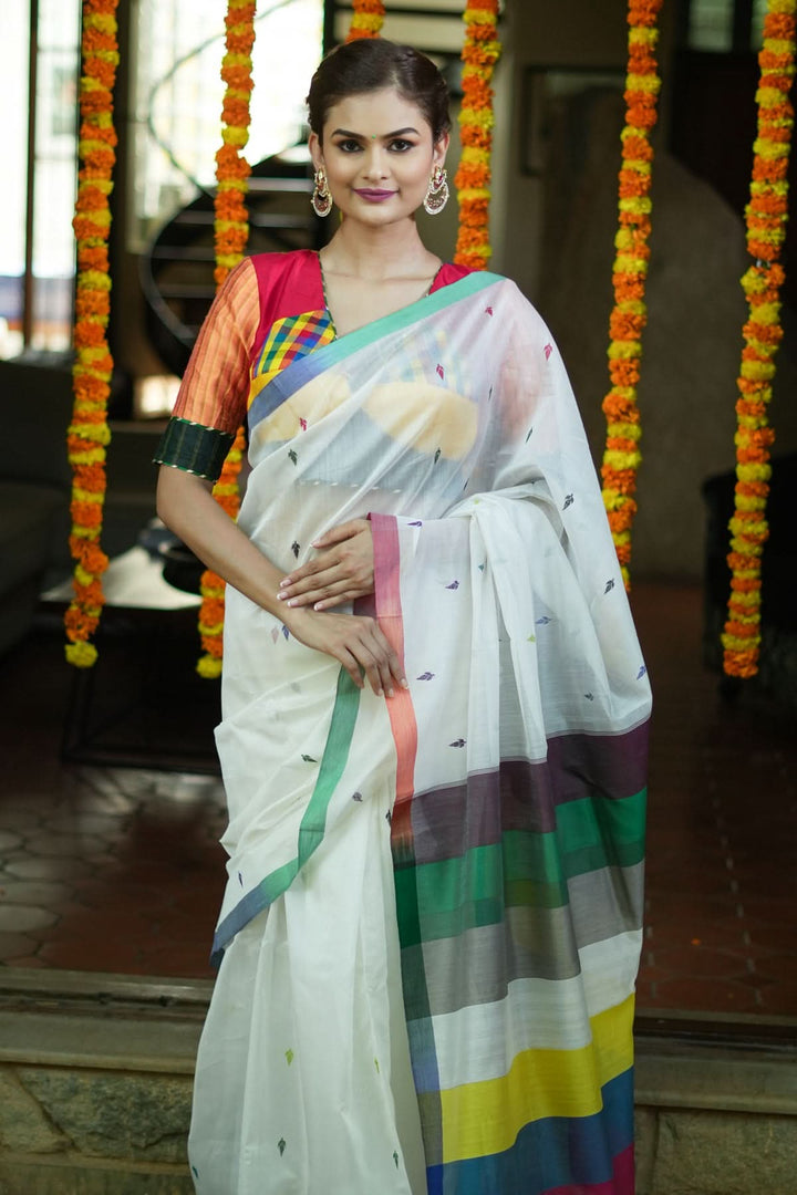 Handwoven Maheshwari Mercerised Cotton Saree  in  White  with Satrangi pallu with long colorful  Tasslels | SHOBITAM