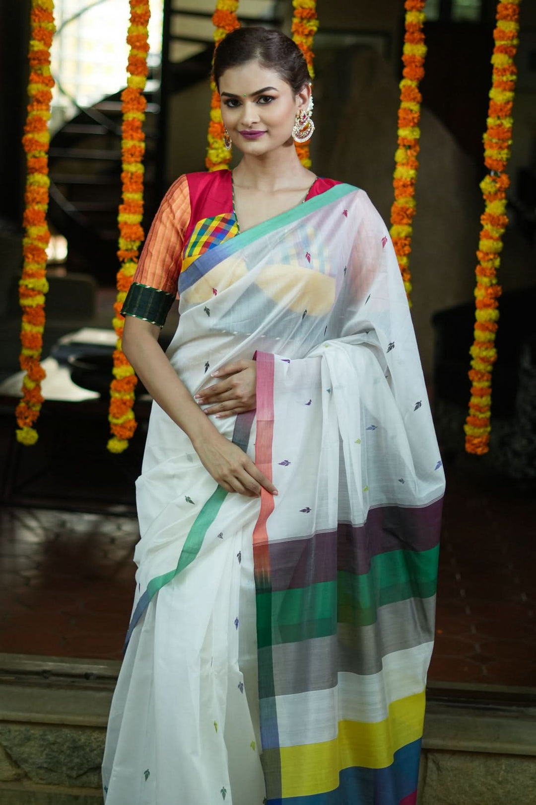 Handwoven Maheshwari Mercerised Cotton Saree  in  White  with Satrangi pallu with long colorful  Tasslels | SHOBITAM