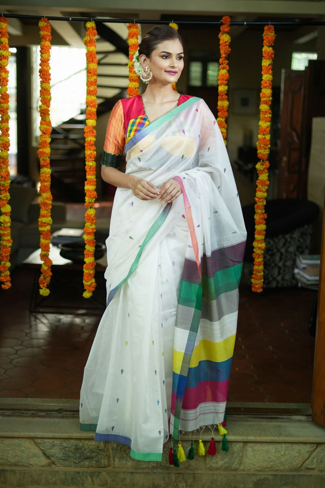 Handwoven Maheshwari Mercerised Cotton Saree  in  White  with Satrangi pallu with long colorful  Tasslels | SHOBITAM