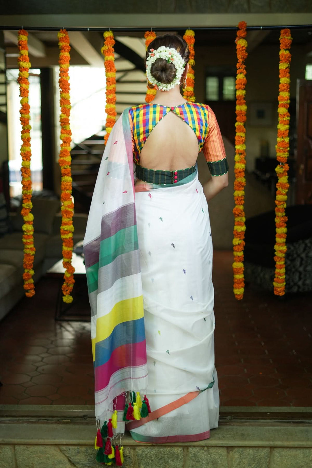 Handwoven Maheshwari Mercerised Cotton Saree  in  White  with Satrangi pallu with long colorful  Tasslels | SHOBITAM