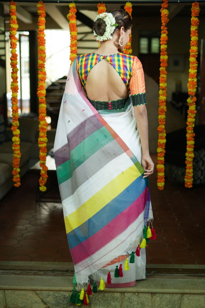 Handwoven Maheshwari Mercerised Cotton Saree  in  White  with Satrangi pallu with long colorful  Tasslels | SHOBITAM