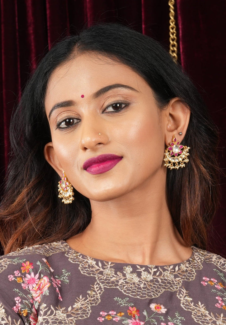 Floral Crescent shaped Kundan earrings with dangling Pearls