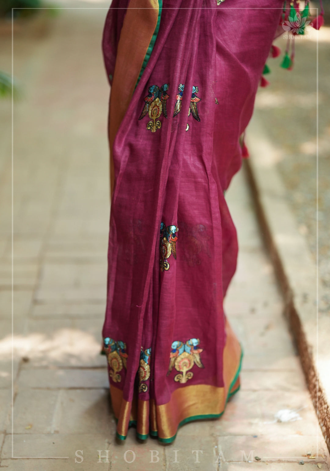 Tanjore Design Twin parrots embroidered motifs on maroon Linen by Linen Saree