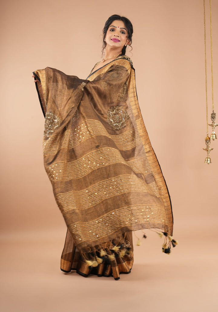 Embroidery cut dana with seqins Work Tissue Linen Saree in copper black with dramatic work Pallu