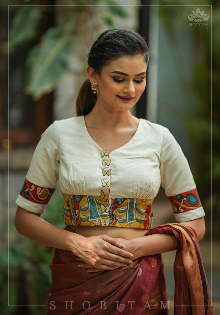 Daisy white V neck blouse with handpainted kalamkari border