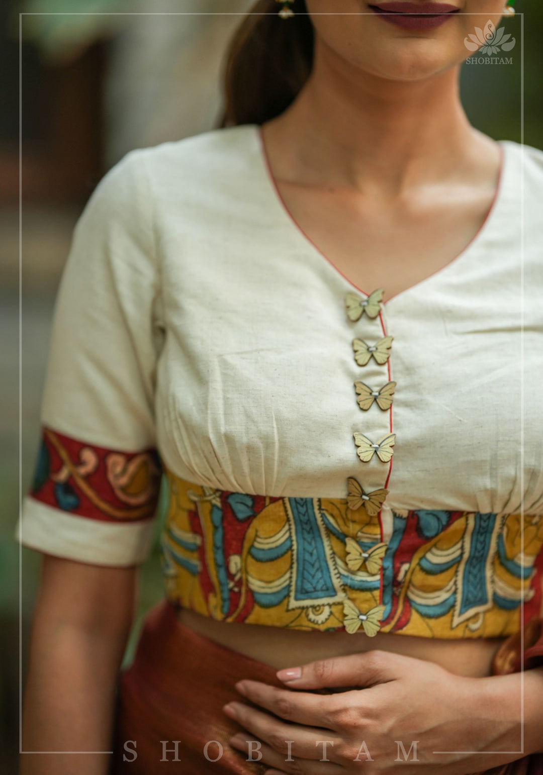 Daisy white V neck blouse with handpainted kalamkari border