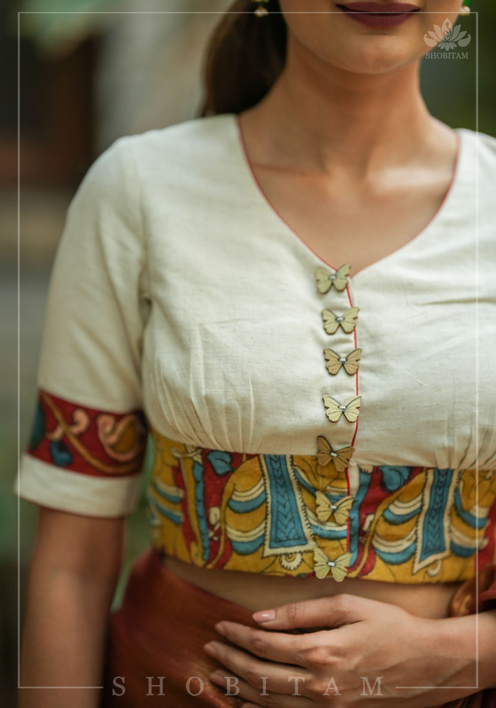 Daisy white V neck blouse with handpainted kalamkari border