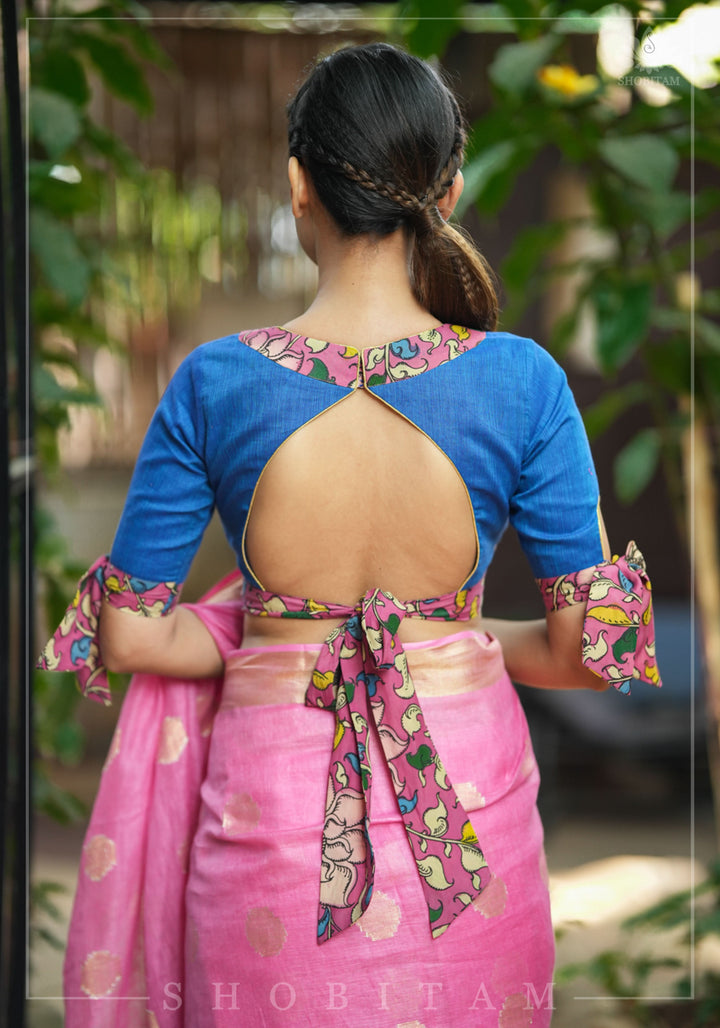 Ocean blue handloom V neck blouse with rose pink handpainted kalamkari border detailing.