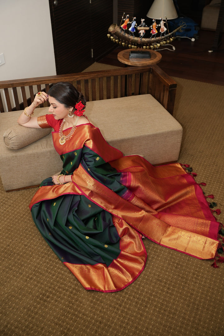 Pre order Bottle Green Dual Tone Pure Kanjivaram Silk Saree with Zari Buttas and Contrast Zari Border | SILK MARK CERTIFIED