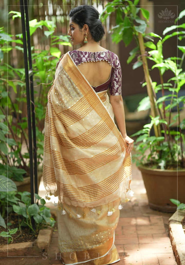 Tan Gold Tissue Linen Saree with light mirror work