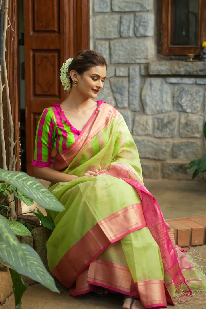 Handwoven Maheshwari silk cotton saree in Pista Green with Zari Checks