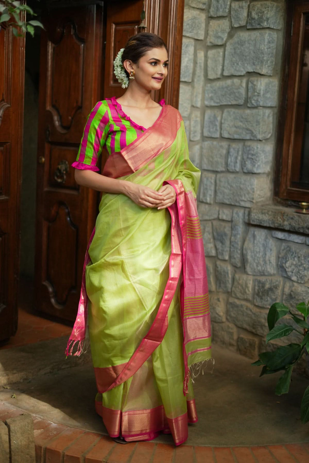 Handwoven Maheshwari silk cotton saree in Pista Green with Zari Checks