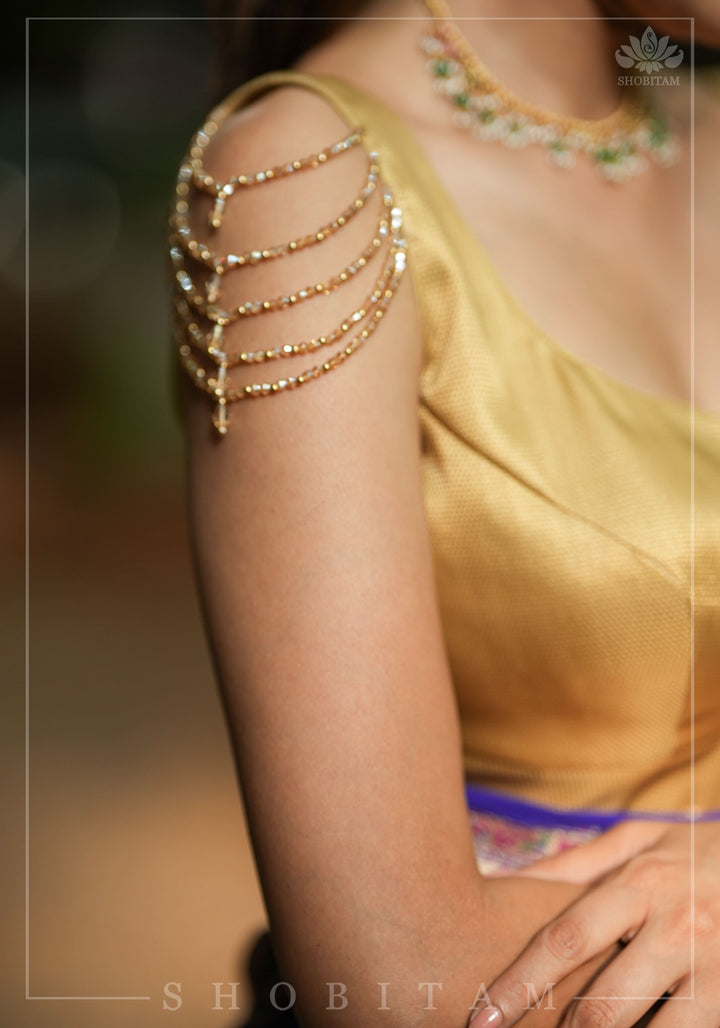 Golden Self Weave Geometric Design Blouse with Dangling multirow crystals over upper arm