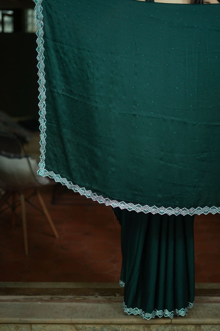 Shamoo Satin Silk saree in Bottle Green with elegant crystal work | SHOBITAM