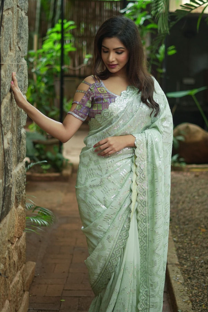 Full Sequins Embellished Georgette Saree in Sage Green with Scalloped border