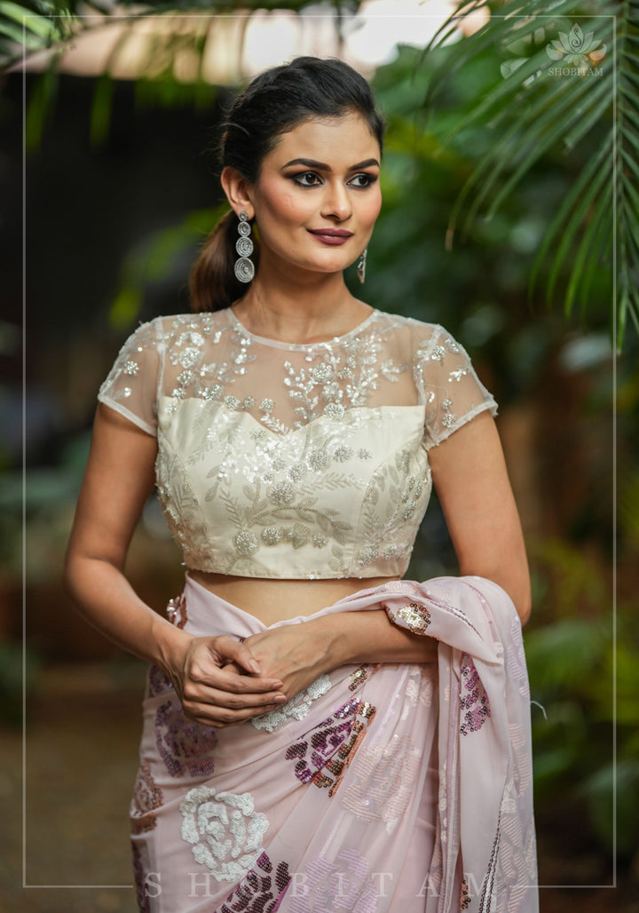 Stunning Ivory Net Blouse with Sheer Yoke and Shimmering Floral Design Sequins