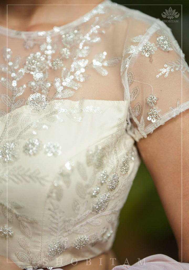Stunning Ivory Net Blouse with Sheer Yoke and Shimmering Floral Design Sequins