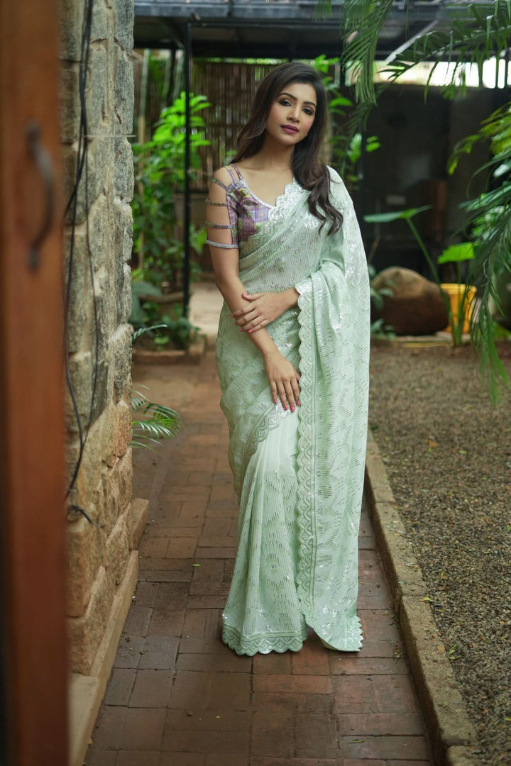 Full Sequins Embellished Georgette Saree in Sage Green with Scalloped border