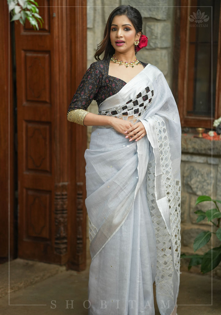 Silver Cutwork and Mirror Work Tissue Linen Saree in White Silver