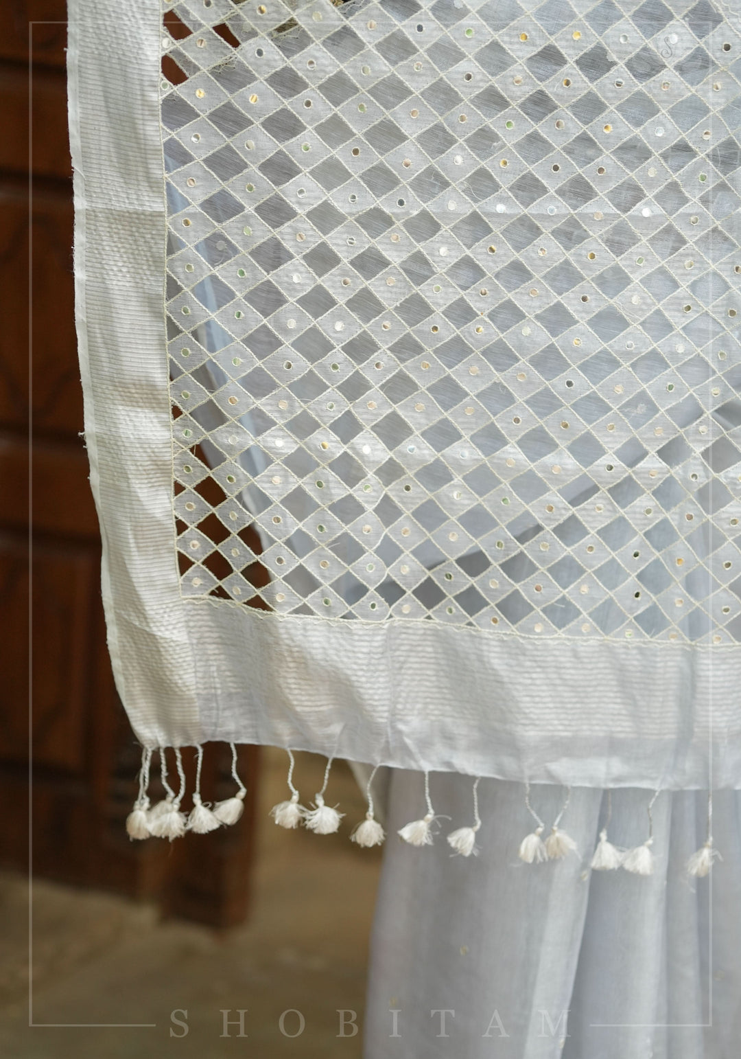Silver Cutwork and Mirror Work Tissue Linen Saree in White Silver