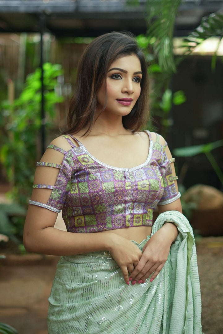 Multicolor Printed Blouse on Lavender Base with multi-strapped sleeves