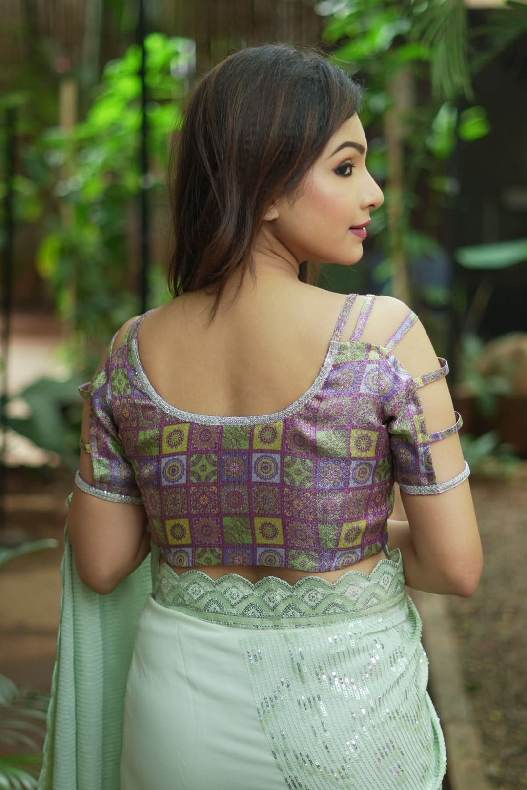 Multicolor Printed Blouse on Lavender Base with multi-strapped sleeves