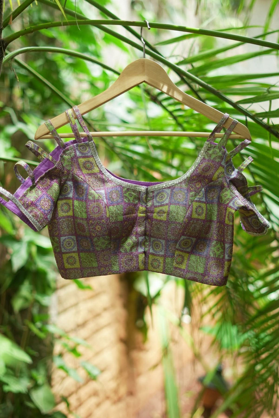 Multicolor Printed Blouse on Lavender Base with multi-strapped sleeves