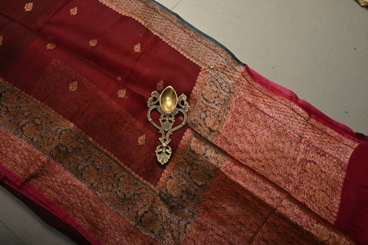 Rich Maroon Pure Banarasi Kora Silk Saree with Oxidized Zari Buttas and Green-Red Two Tone Zari Border | SILK MARK CERTIFIED | SHOBITAM