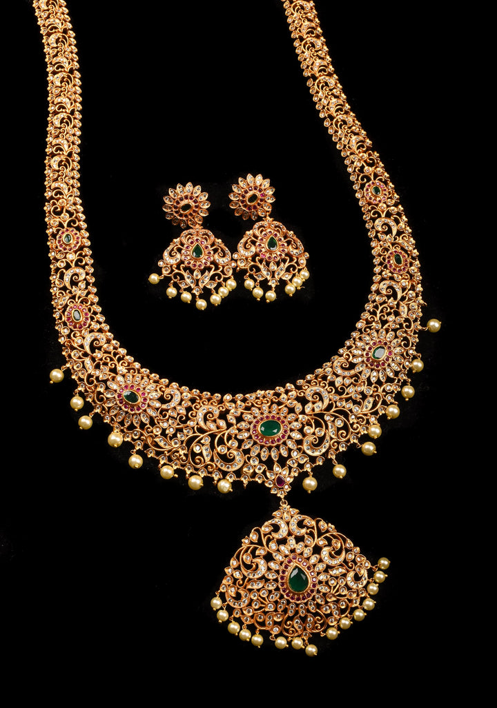 Timeless Elegance: Intricate Gold-Finish Long Haram Set with Gemstones and Pearls